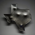 Handcrafted matte black Texas silhouette paraffin pillar candle with smoky marbled detailing and five wood wicks.